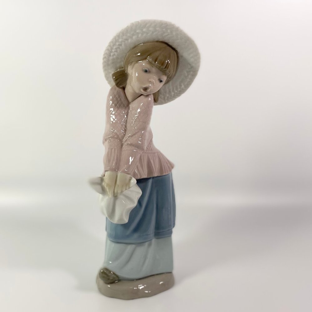 LLadro Nao Girl in Pink Poncho & Bonnet 9" inches pretty figurine